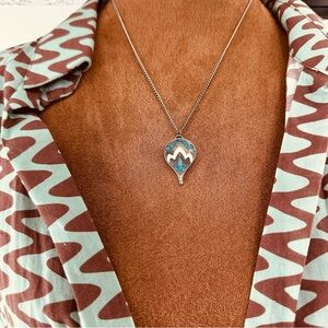 Elegant Silver and Blue Pendant Necklace